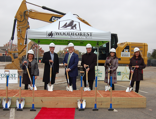 From left: Woodforest National Bank representatives Julie Mayrant, President of Retail Division; Robert E. Marling, Jr., Bank Founder and Chairman; Jay Dreibelbis, Bank President and CEO; George Sowers, Bank Board Member; Patricia Brown, Conroe President; and Linda O’Dell, Conroe Downtown Branch Manager.