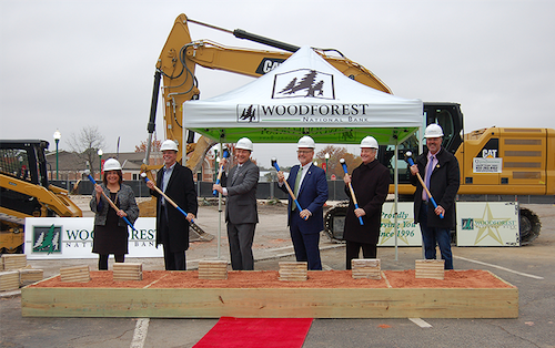 From left: Woodforest National Bank representatives Julie Mayrant, President of Retail Division; Robert E. Marling, Jr., Bank Founder and Chairman; Conroe Mayor Pro Tem Raymond McDonald; Jay Dreibelbis, Bank President and CEO; George Sowers, Bank Board Member; and Curt Maddux, Conroe City Councilman.