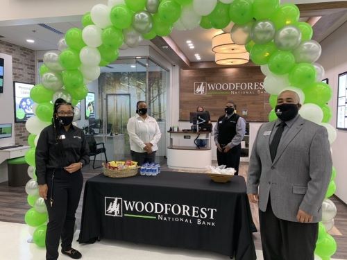 New Woodforest Bank location at 2014 S. Irby St. Florence, SC, 29505 inside Walmart. Pictured left to right: Alysia Allen, Retail Banker, Deavanie Smith, Retail Banker, Allen Husband, Field Services, Avery Moore, Retail Banker and Kevin Goodwin, Branch Manager