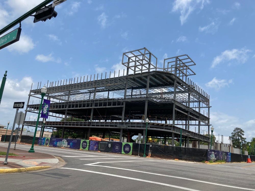 Construction is underway for the Woodforest National Bank branch and mixed-used business center in Downtown Conroe.