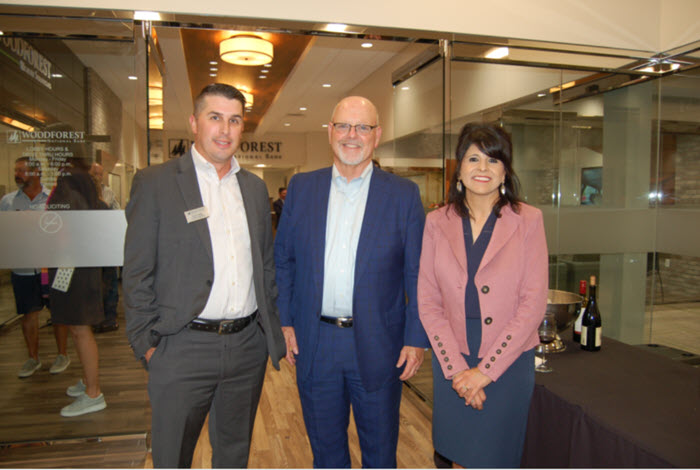 (From  left): Pictured from Woodforest National Bank Josh Fowler, Assistant  VP, Market Manager - Retail; Jay D Jay Dreibelbis, President and CEO,  and Patricia Brown, President of Conroe. (Photo by Liz Grimm)