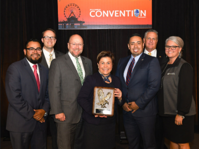 Woodforest National Bank Wins Two IBAT Best of Community Banking Awards for Community Service and Financial Literacy. Pictured front row: Krystian Reyes, Doug Schaeffer, Julie Mayrant, Daniel Galindo and Brenda Wendt from Woodforest National Bank Pictured back row: Christopher Williston, President and CEO, and Ronnie Miller, Immediate Past Chairman from Independent Bankers Association of Texas.